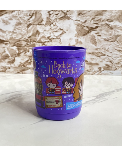 Vaso color morado con estampado de Harry Pother TupperWare