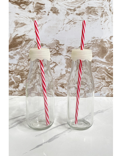 Botella de cristal con pajilla